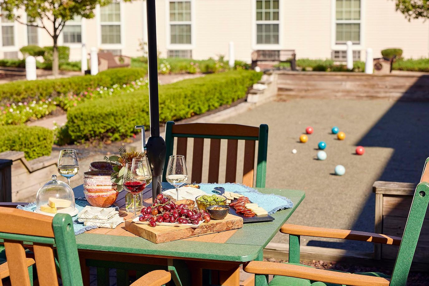 Outdoor dining setup with food and games