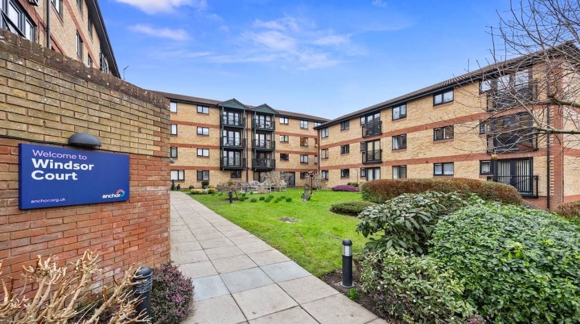 Exterior view of Windsor Court building with outdoor space