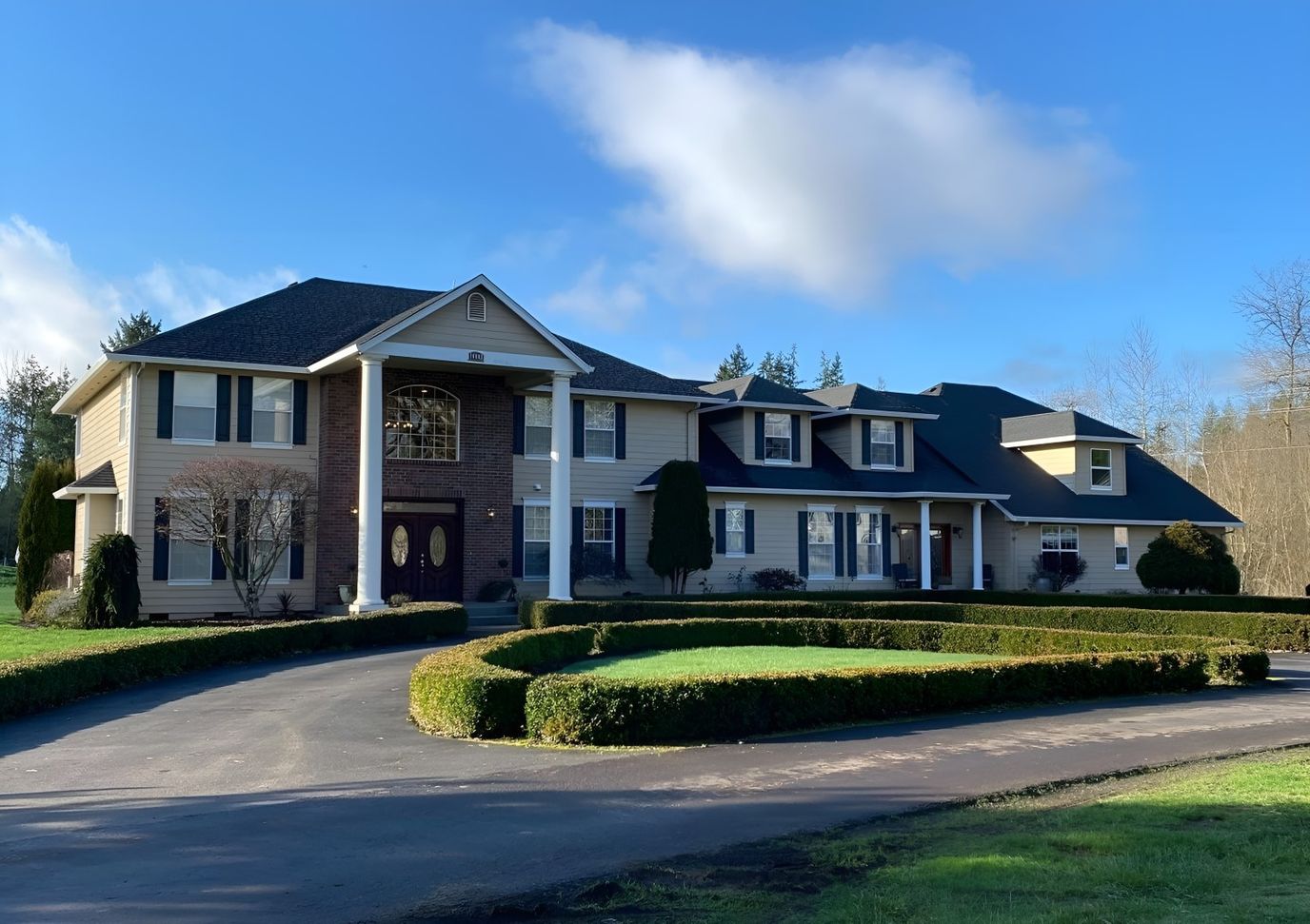 Exterior view of a senior living facility with manicured landscaping