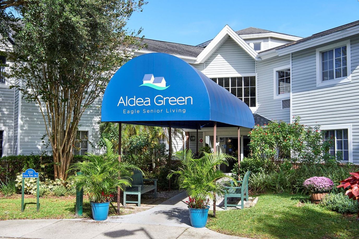 Exterior view of Aldea Green senior living facility