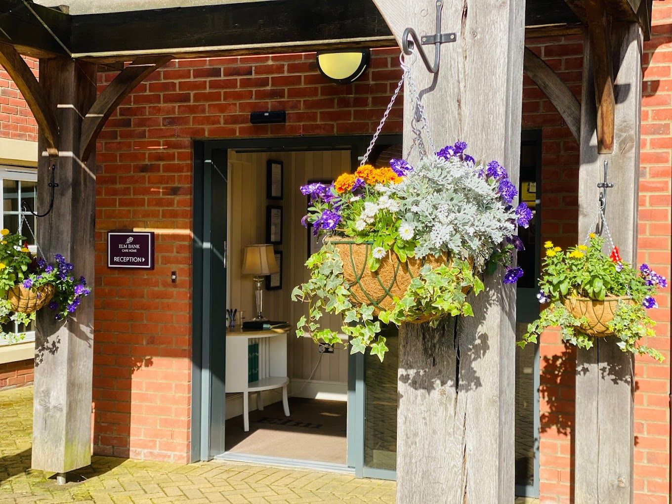 Entrance of a retirement village with flower planters
