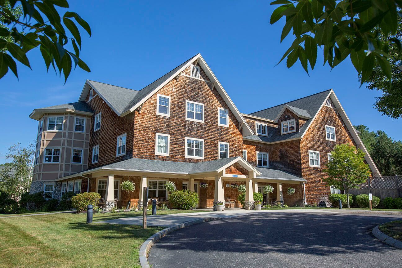 Exterior view of Bay Square at Yarmouth with landscaped entrance