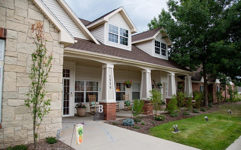 Exterior view of Bickford of Fort Dodge with flowerpots.