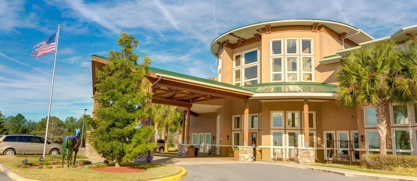 Exterior view of Brentwood at Fore Ranch with flag