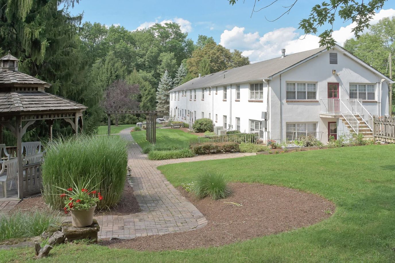 Outdoor view of the facility with gardens and pathway