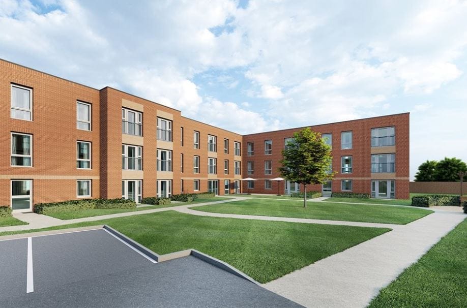 Exterior view of a senior living facility with landscaping