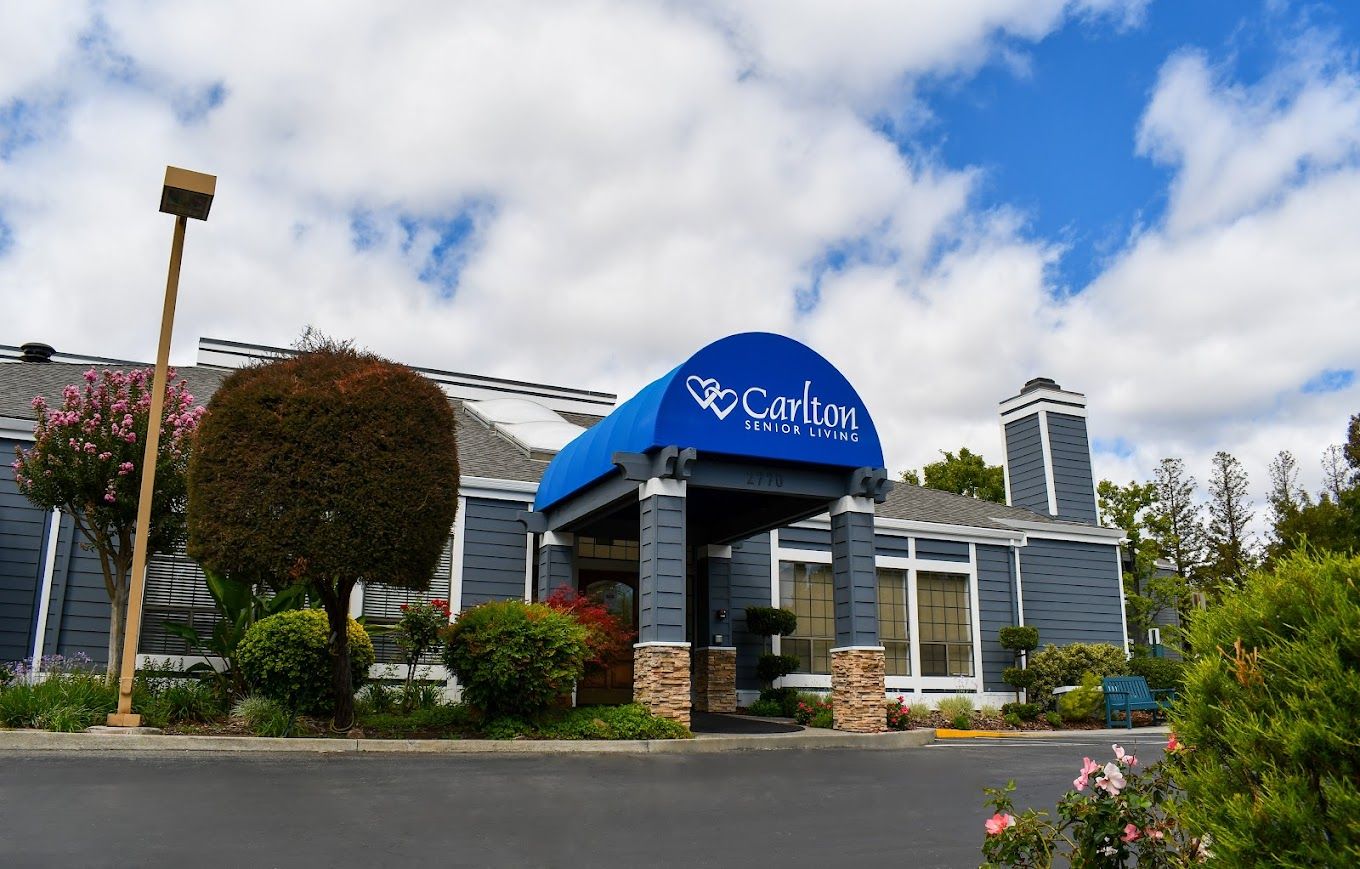 Exterior view of Carlton Senior Living facility entrance