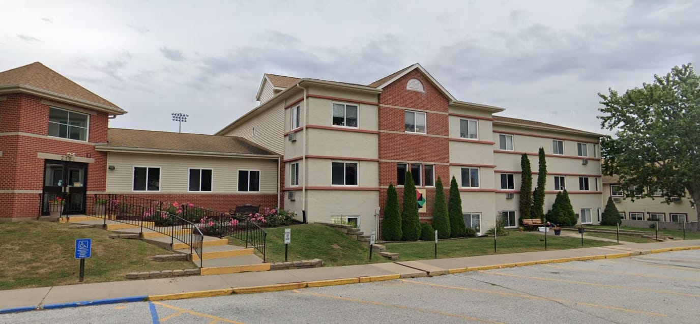 Exterior view of Elm Crest Senior Living Community building