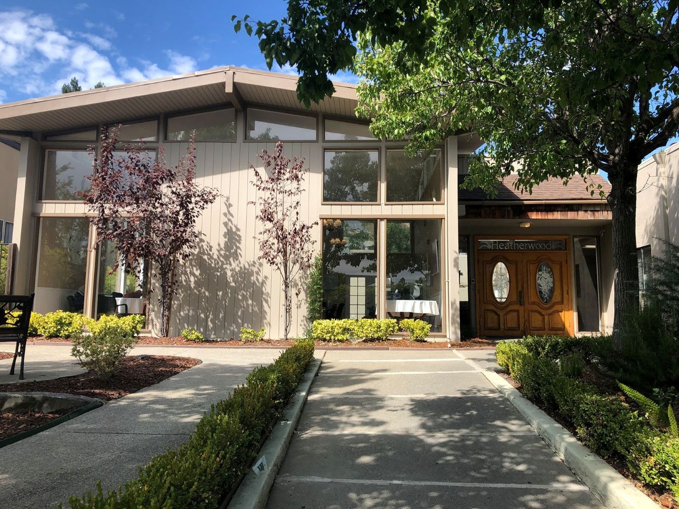 Exterior view of Heatherwood Memory Care building entrance