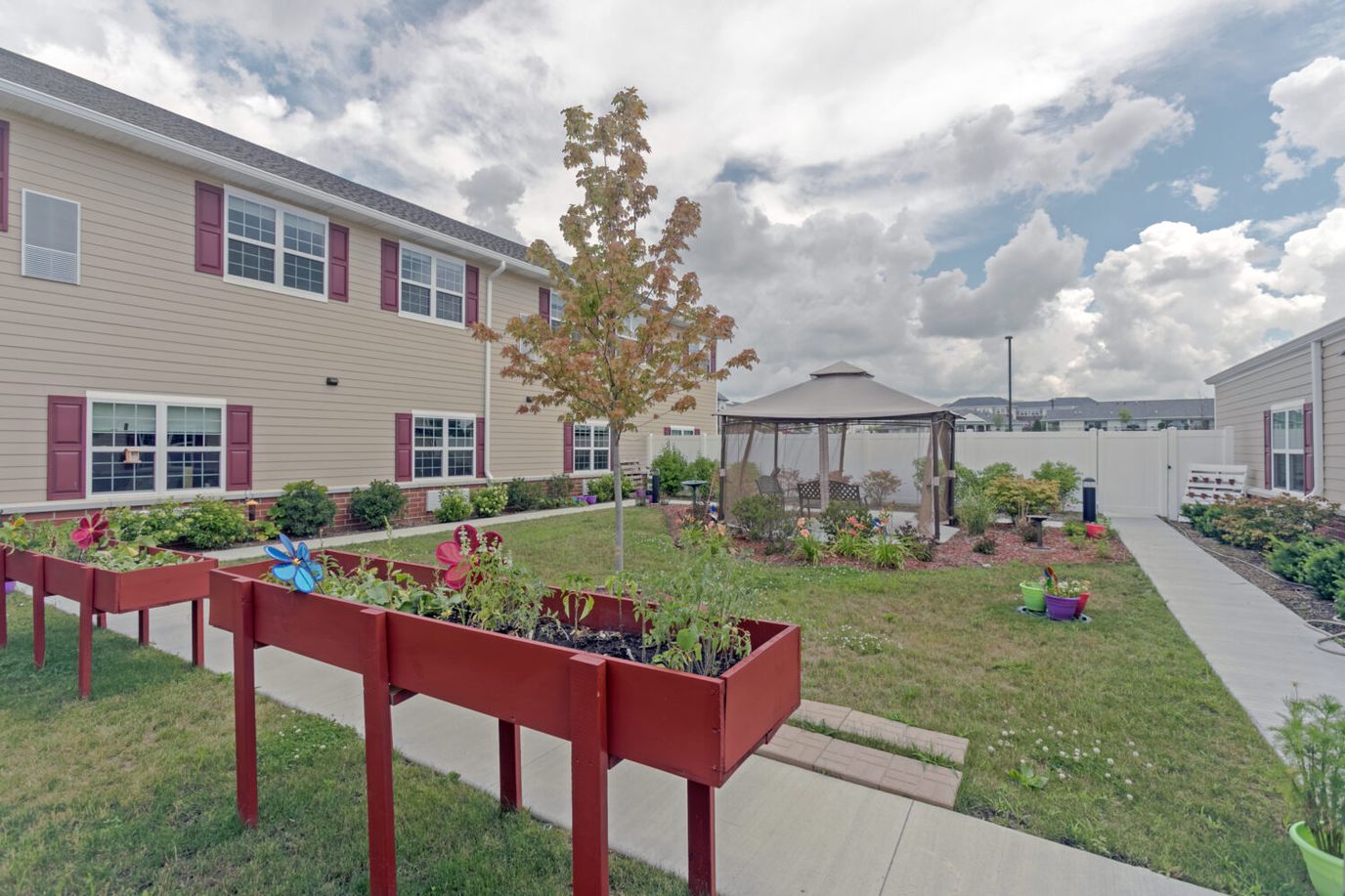 Outdoor garden area with seating and landscaping