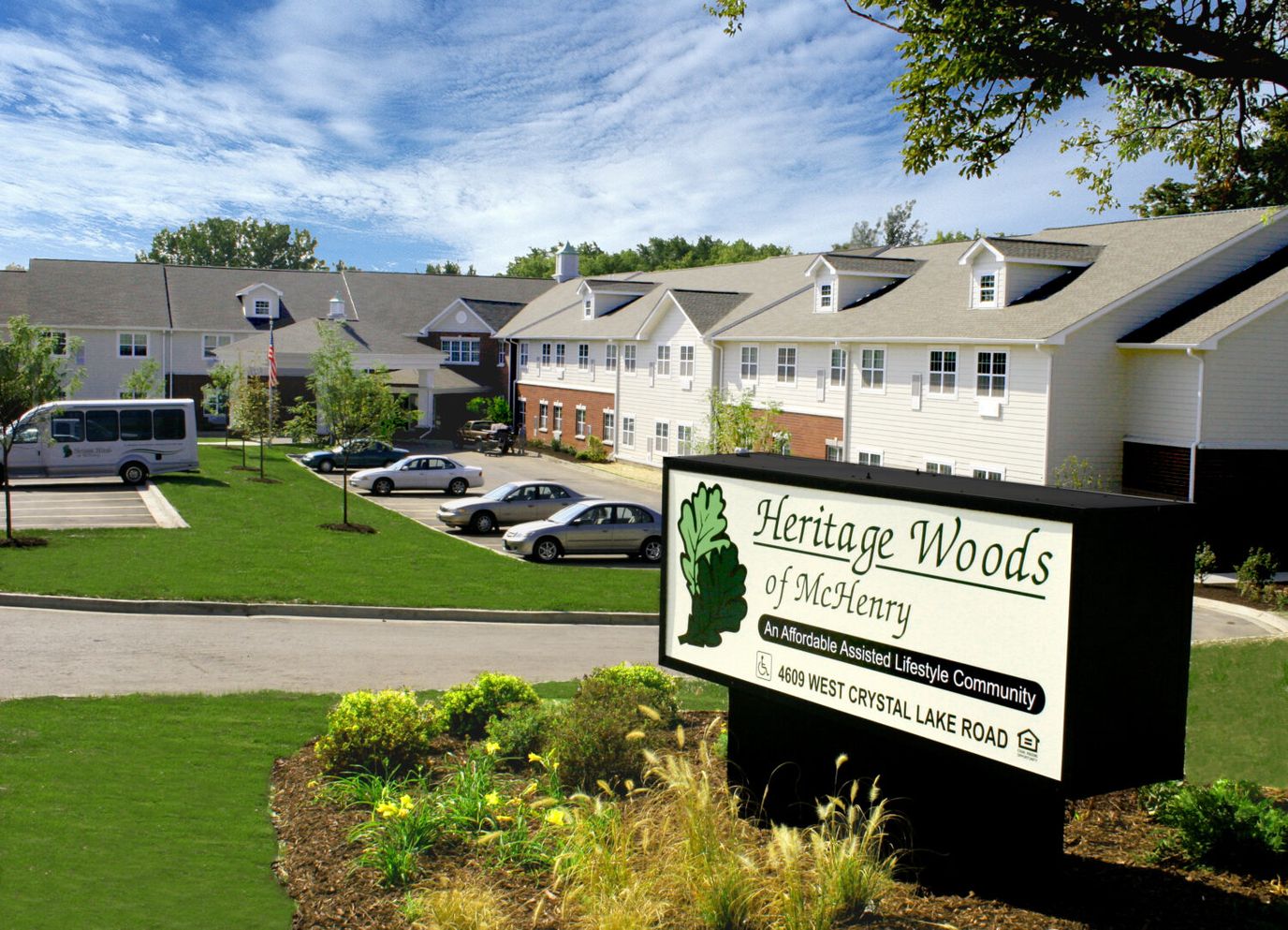 Exterior view of Heritage Woods of McHenry with signage