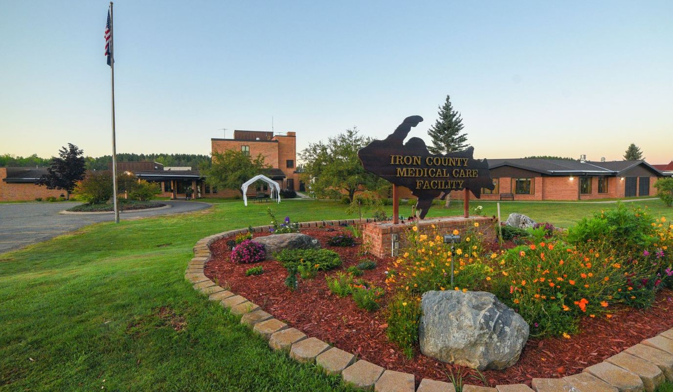 Front entrance of Iron County Medical Care Facility with landscaping