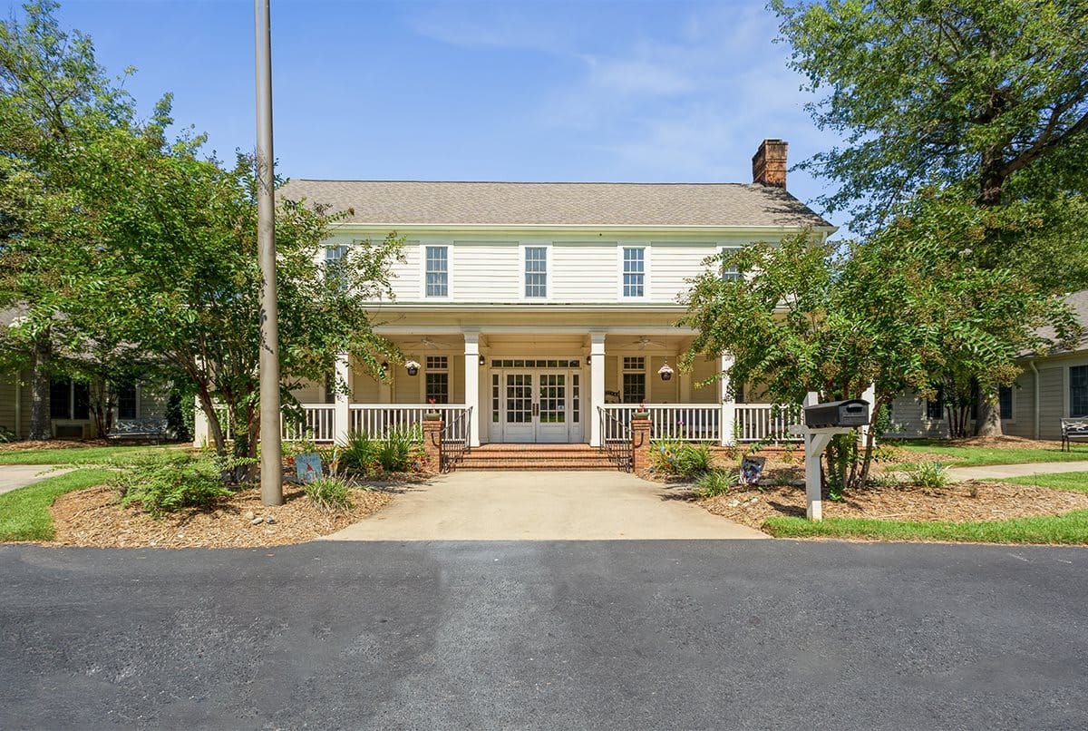 The exterior of Keowee Square with gardens and entryway