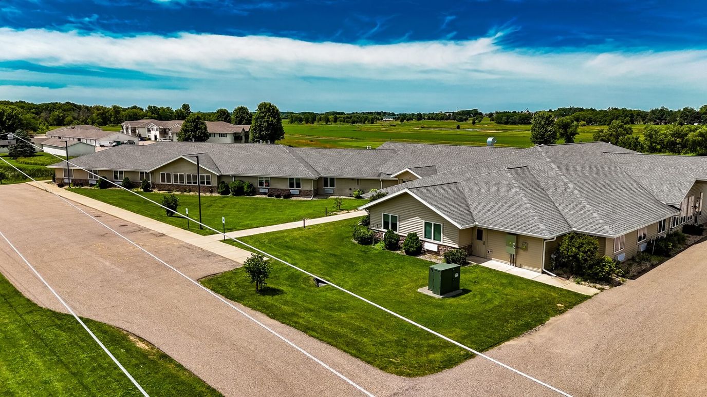Aerial view of Larson House with green lawns and walkways