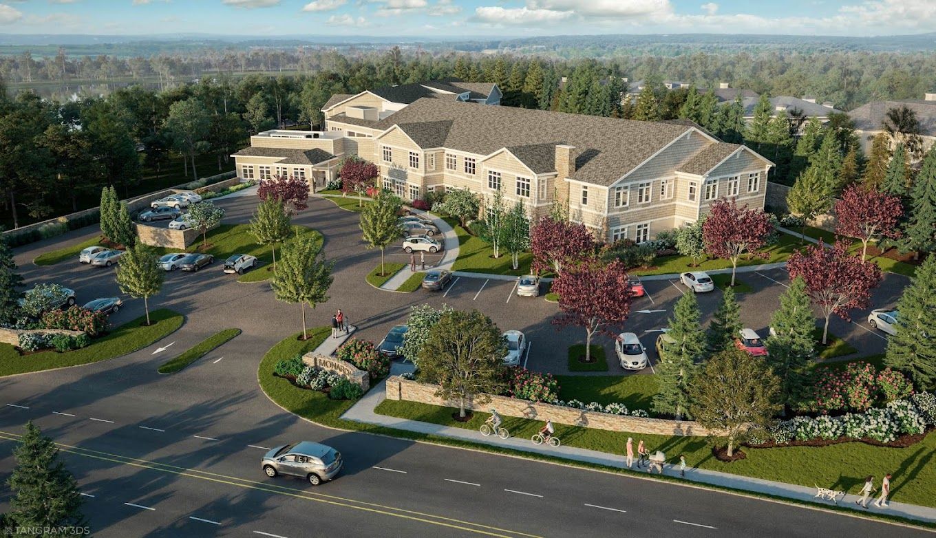 Aerial view of Monarch Coopers Corner with outdoor spaces and vehicles