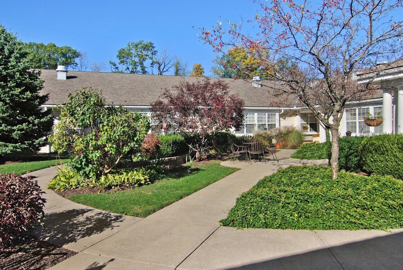 Outdoor garden area with walking paths and seating