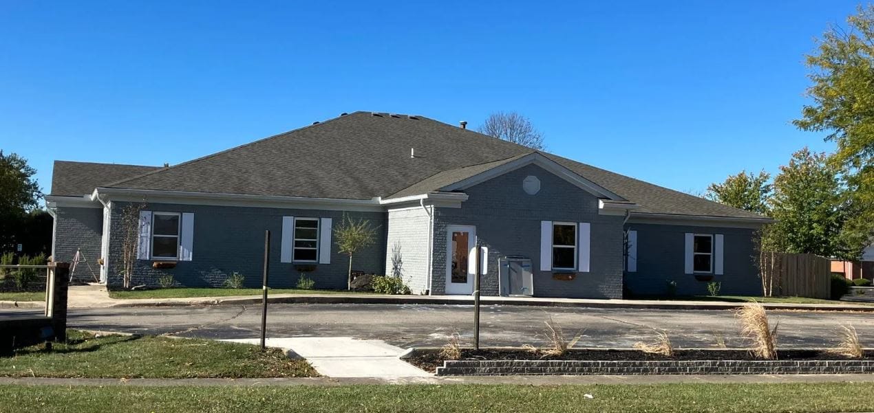 Exterior view of a senior living facility building.