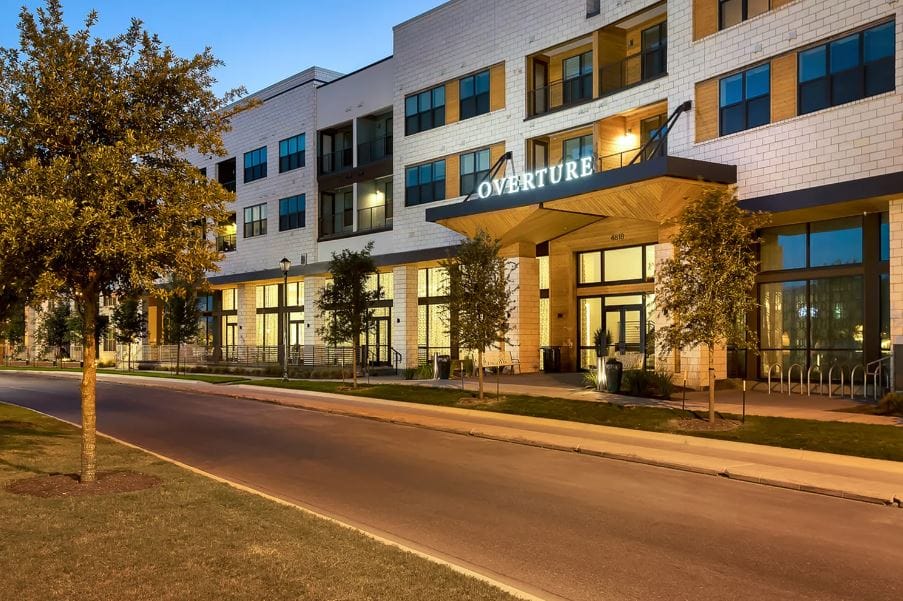 Exterior view of Overture Mueller at dusk