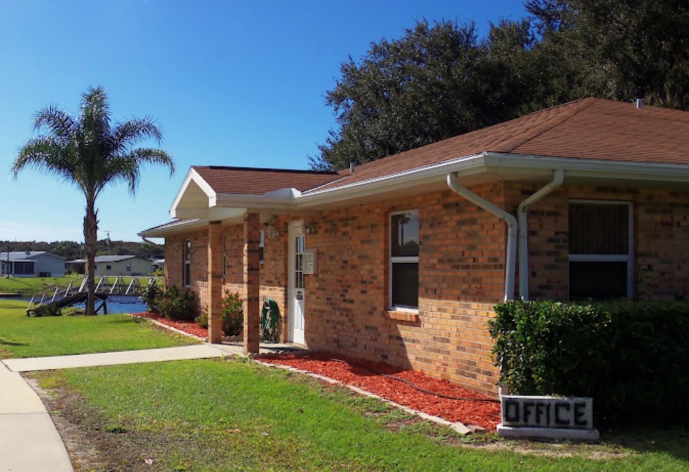 Exterior view of facility office with landscaping