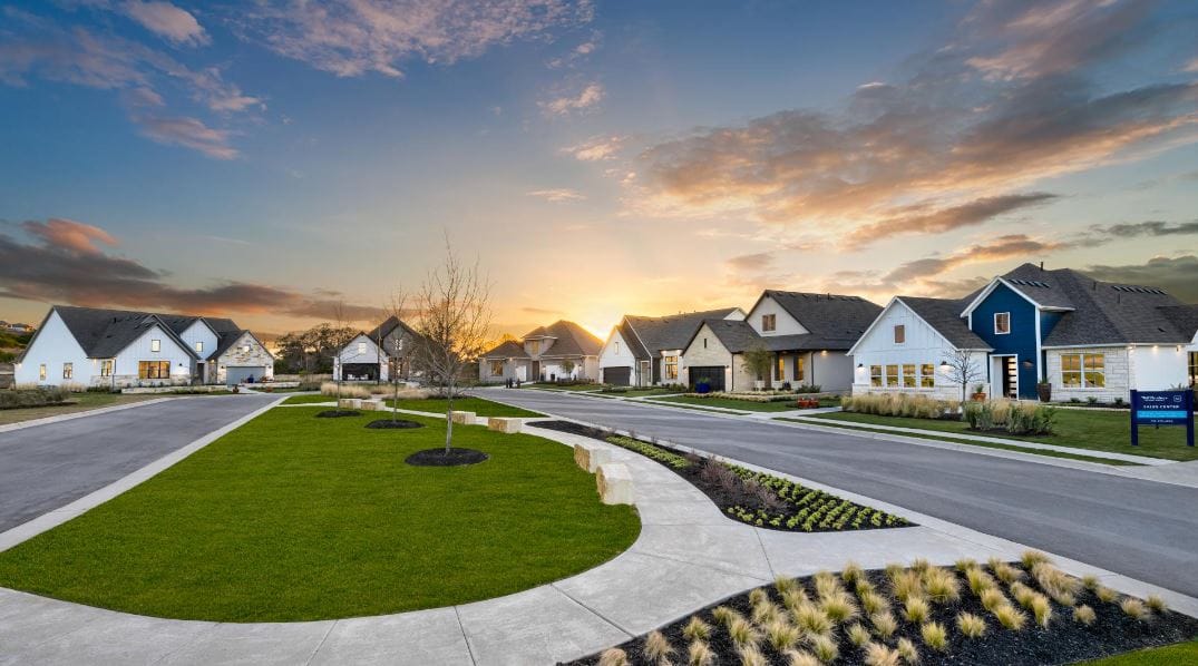 Residential buildings in a serene outdoor setting at sunset