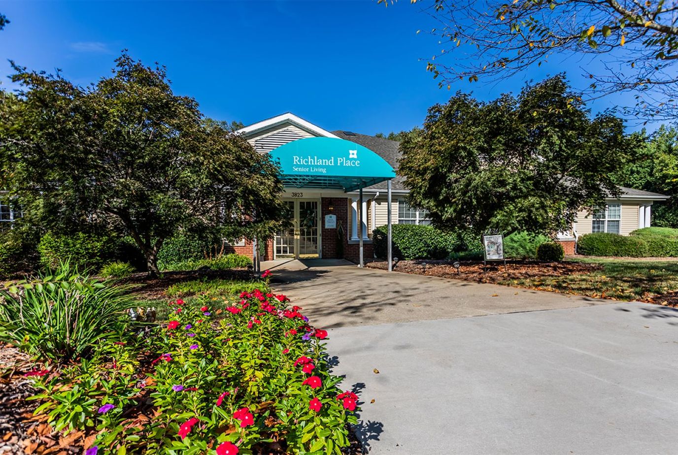Exterior view of Richland Place with landscaped entrance