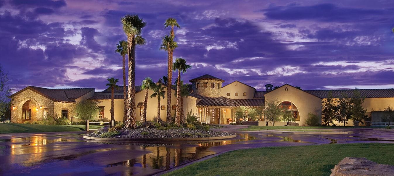 Building exterior of Robson Ranch Arizona at twilight