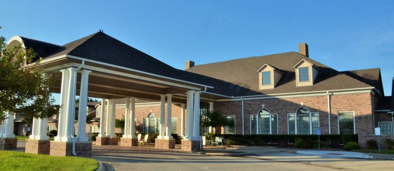 Exterior view of Rosewood Villas with covered entrance