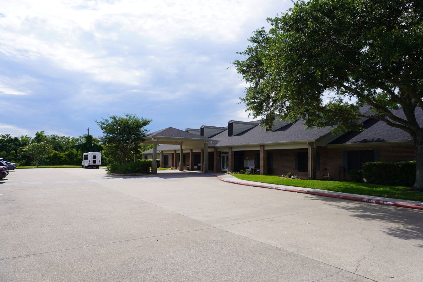 Exterior view of the facility building and parking area