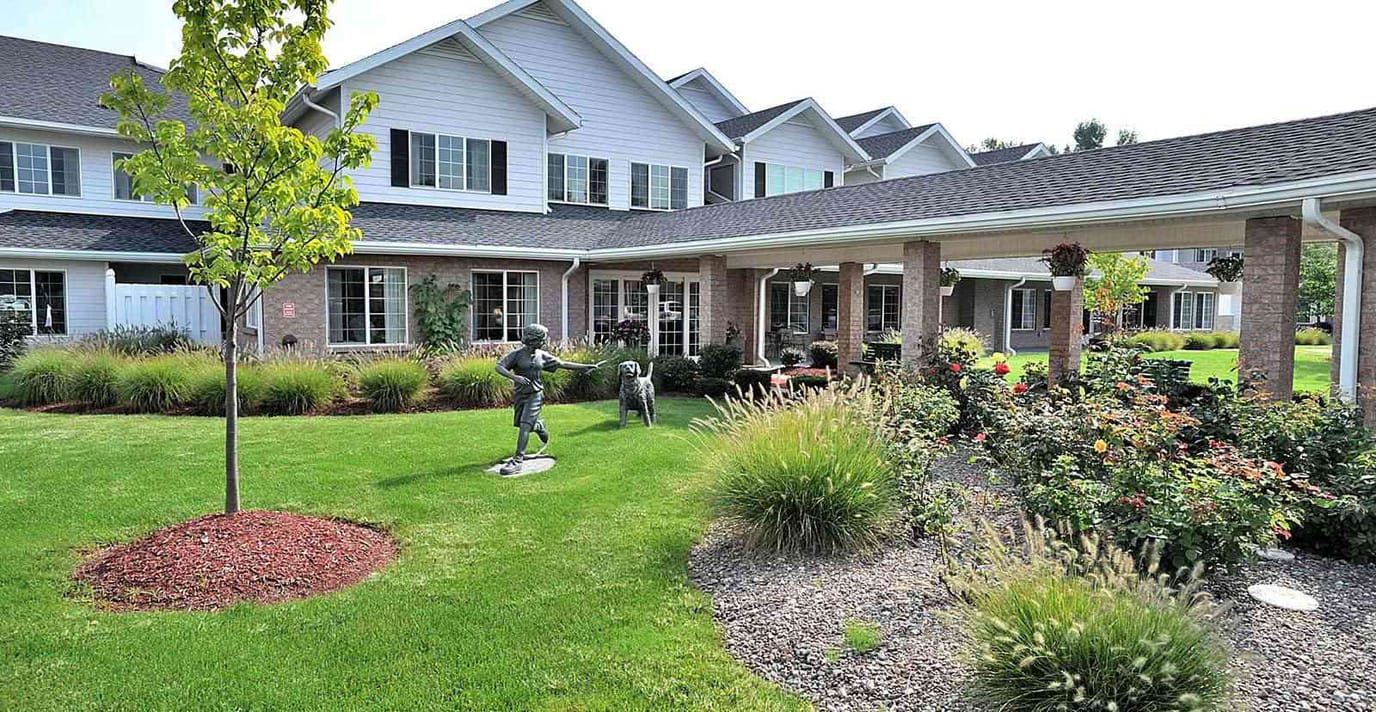 Outdoor view of the facility's garden and entrance