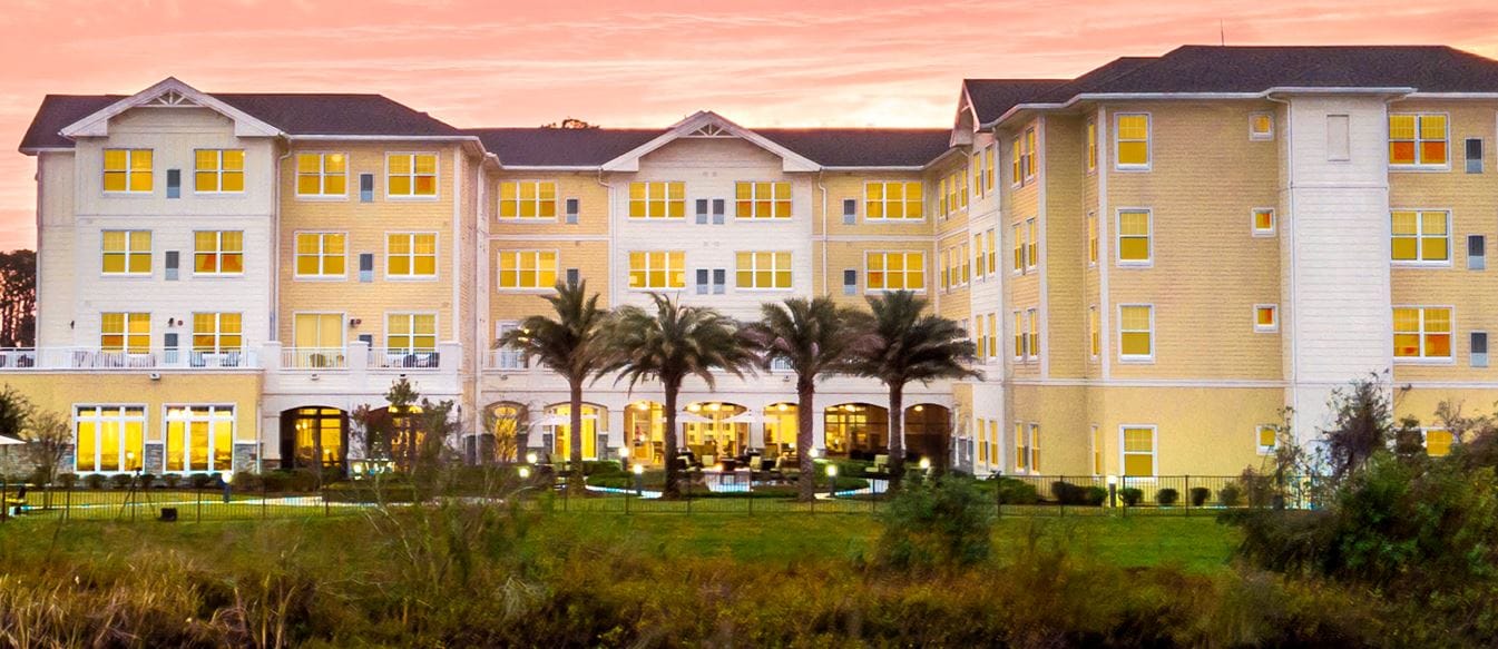 Exterior view of Sonata Windermere at sunset