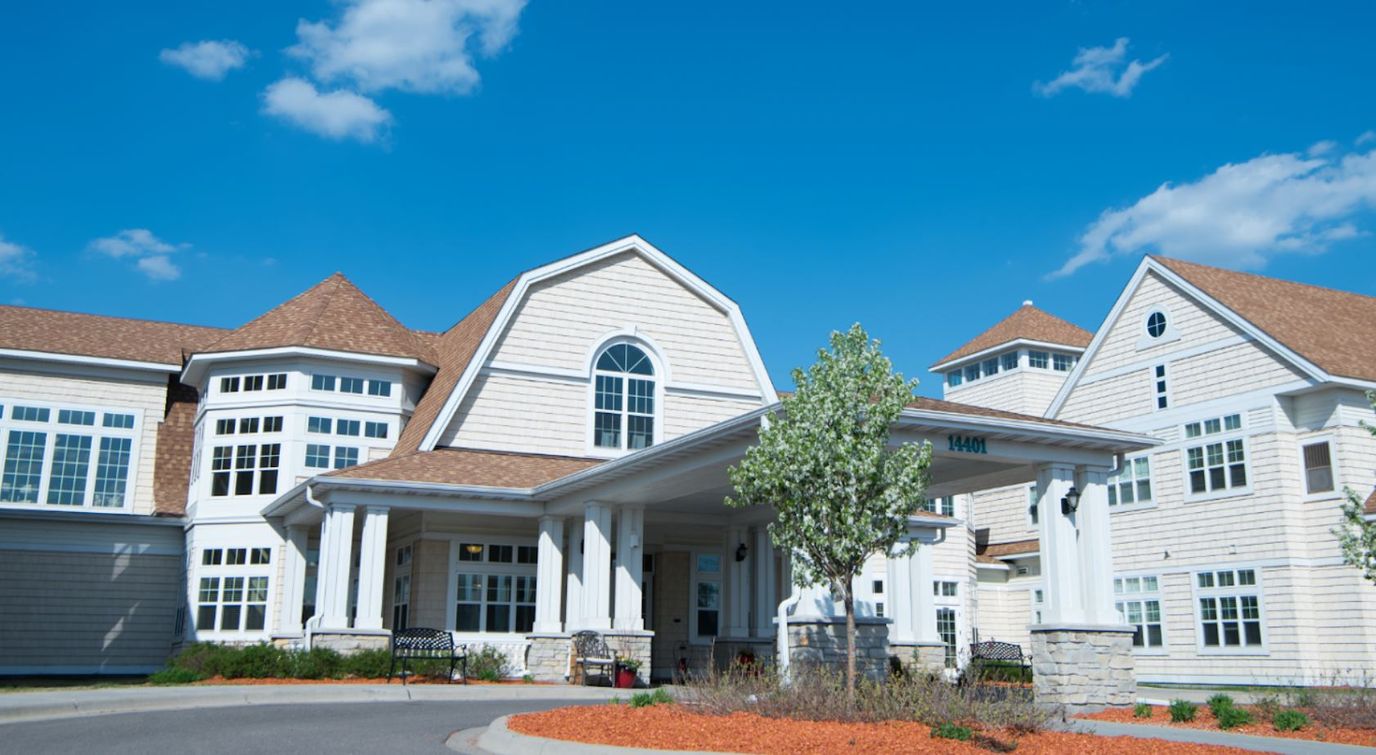 Exterior view of the Stoney River Ramsey building with landscaping