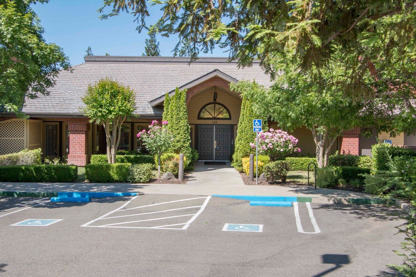 Exterior view of the facility entrance and landscaping
