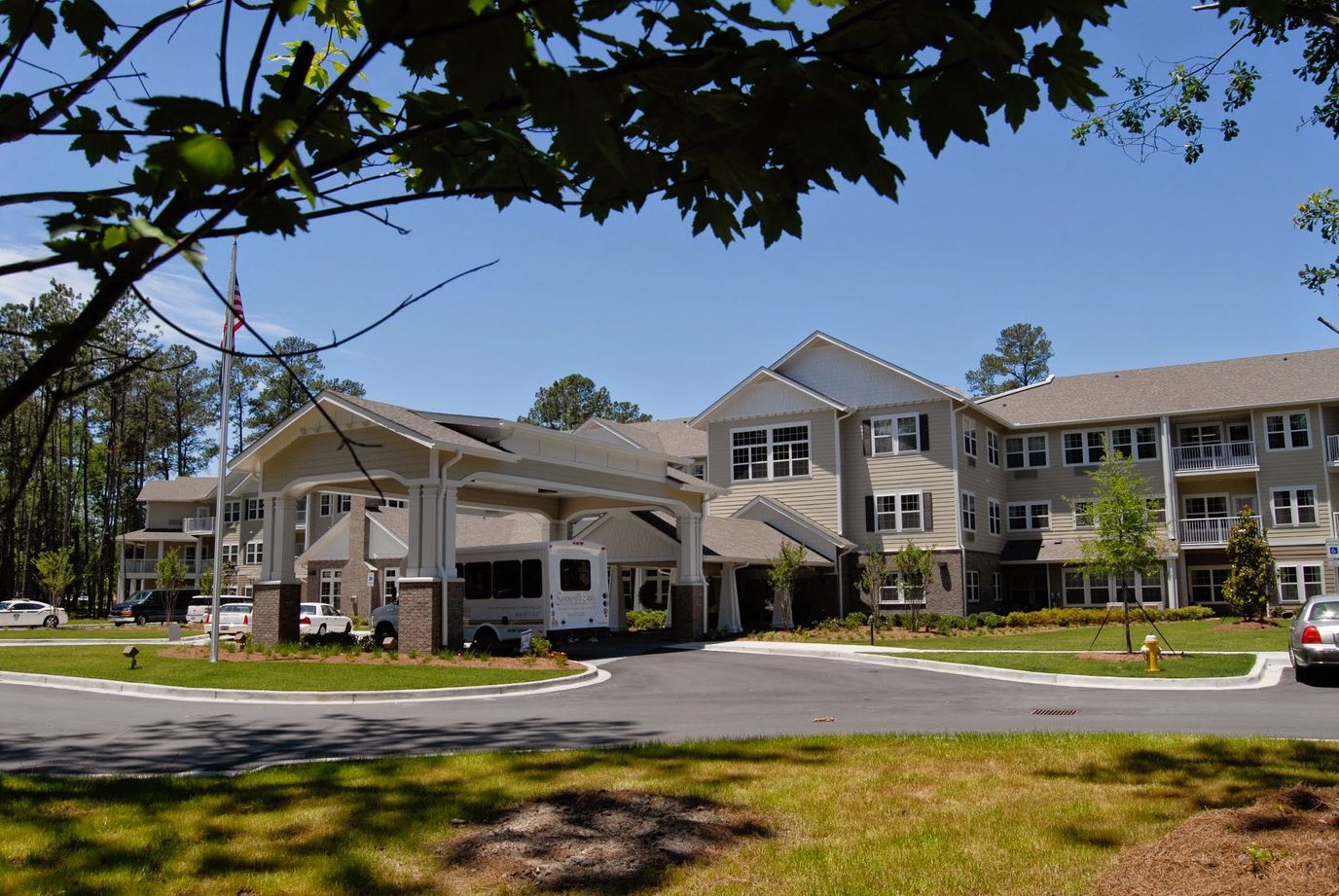 Well-lit exterior view of Summerville Estates with landscaped entrance