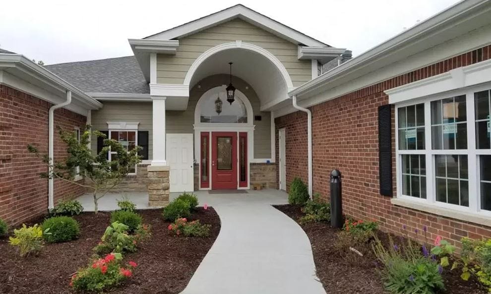 Exterior view of The Arbors at Harmony Gardens entrance.