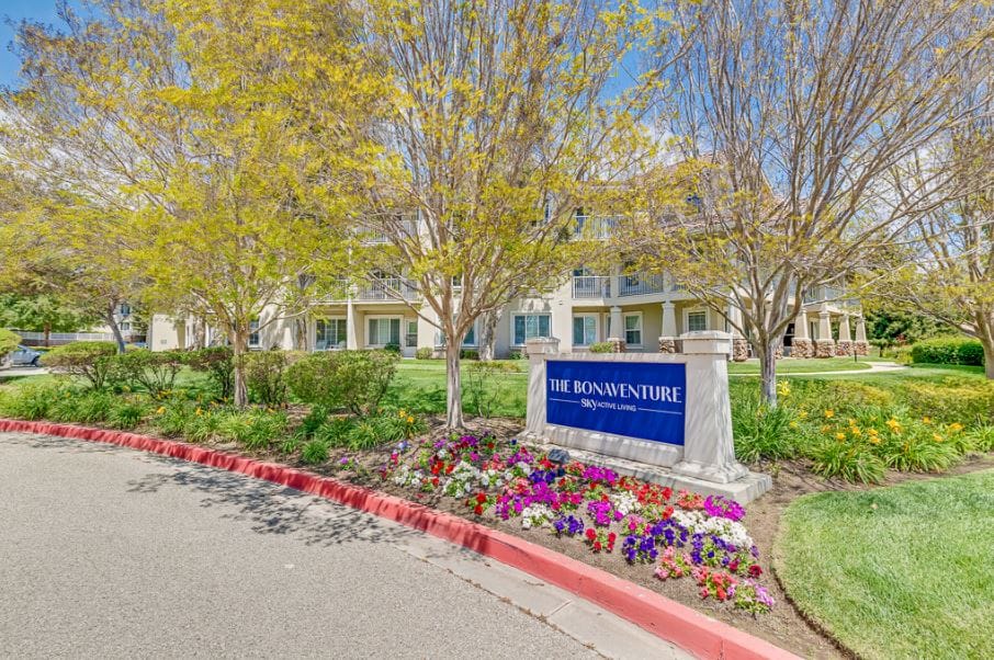 Exterior view of The Bonaventure Senior Living with landscaped gardens