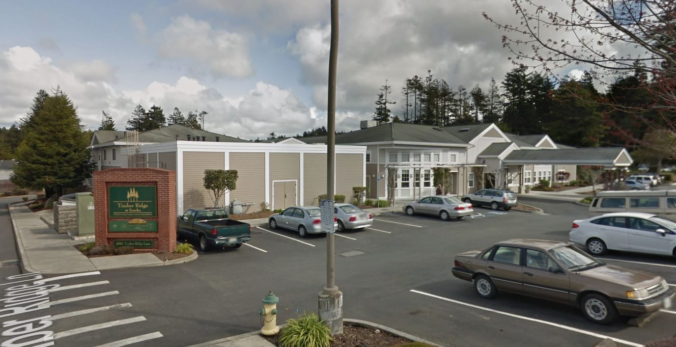Exterior view of Timber Ridge at Eureka with parking area