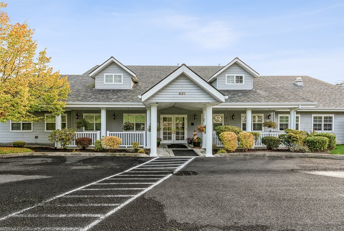 Exterior view of Victoria Place Senior Living facility