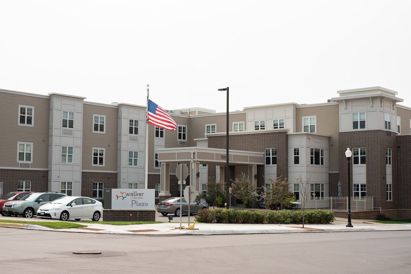 Exterior view of Walker Plaza senior living facility
