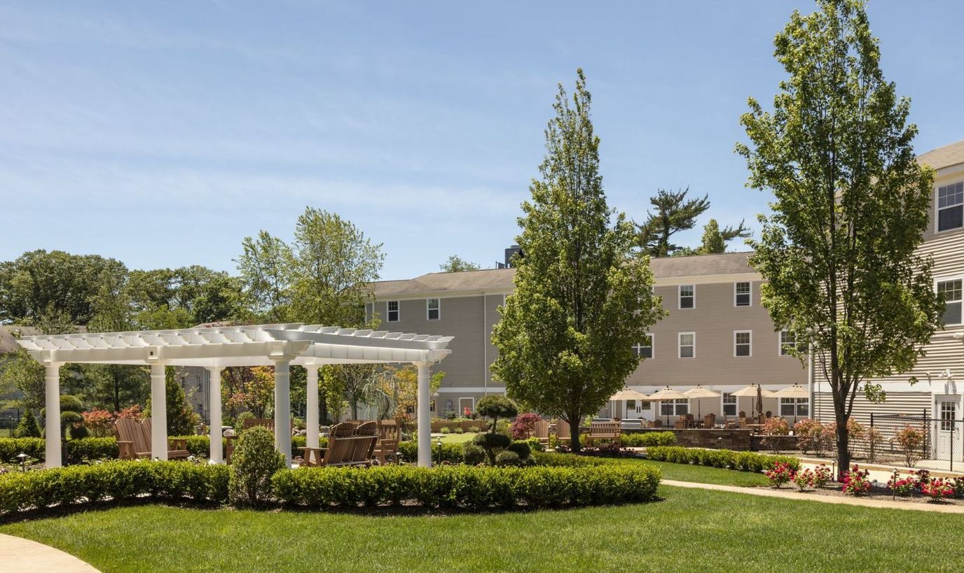 Outdoor courtyard with seating and greenery