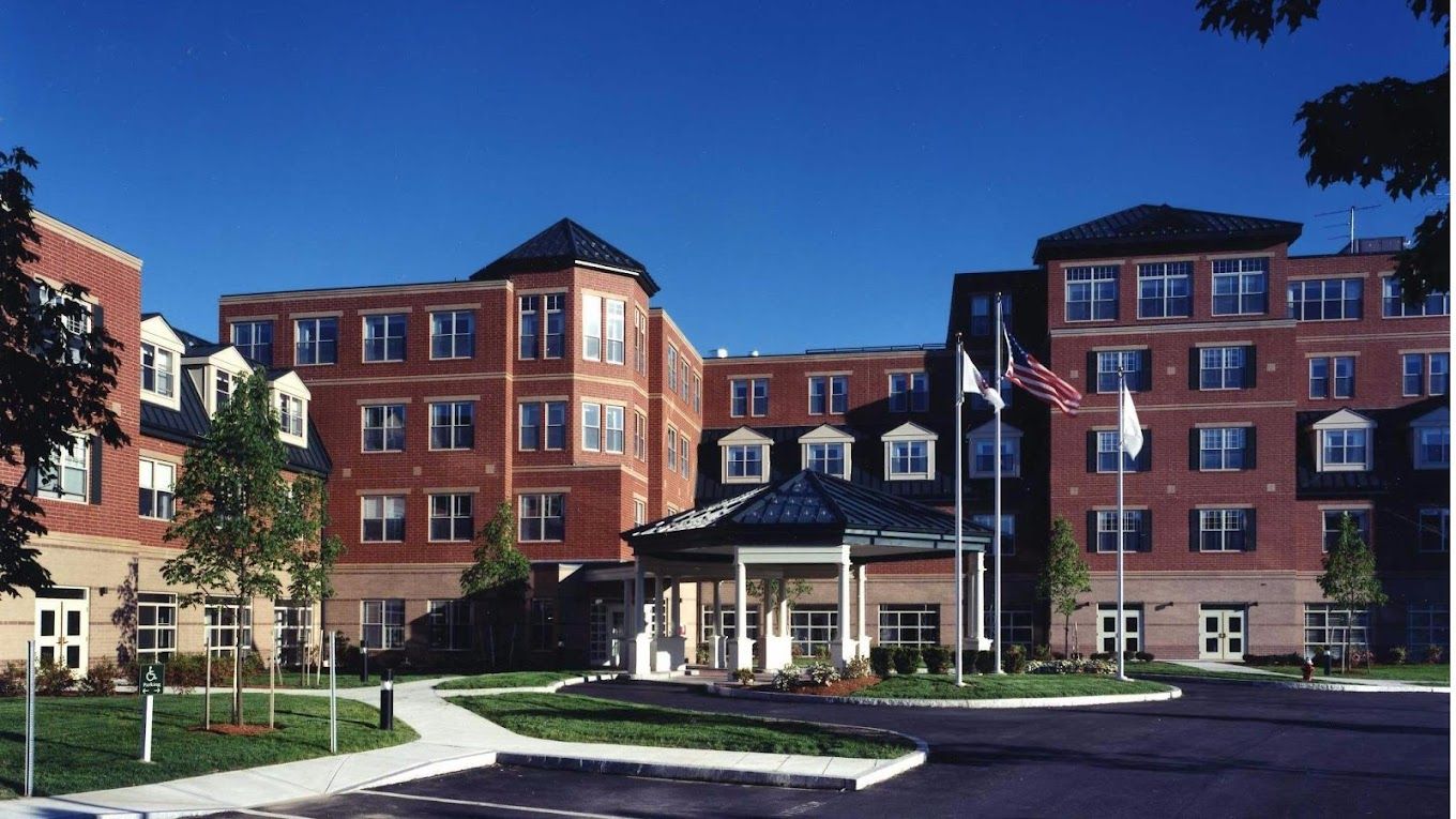 Exterior view of Whitney Place Assisted Living building