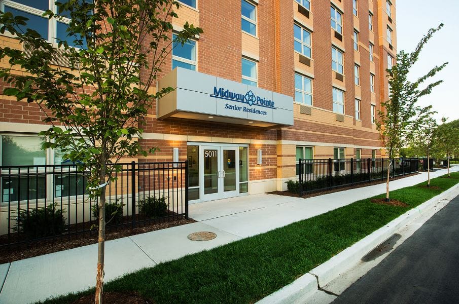 Exterior view of Midway Pointe Senior Living building entrance