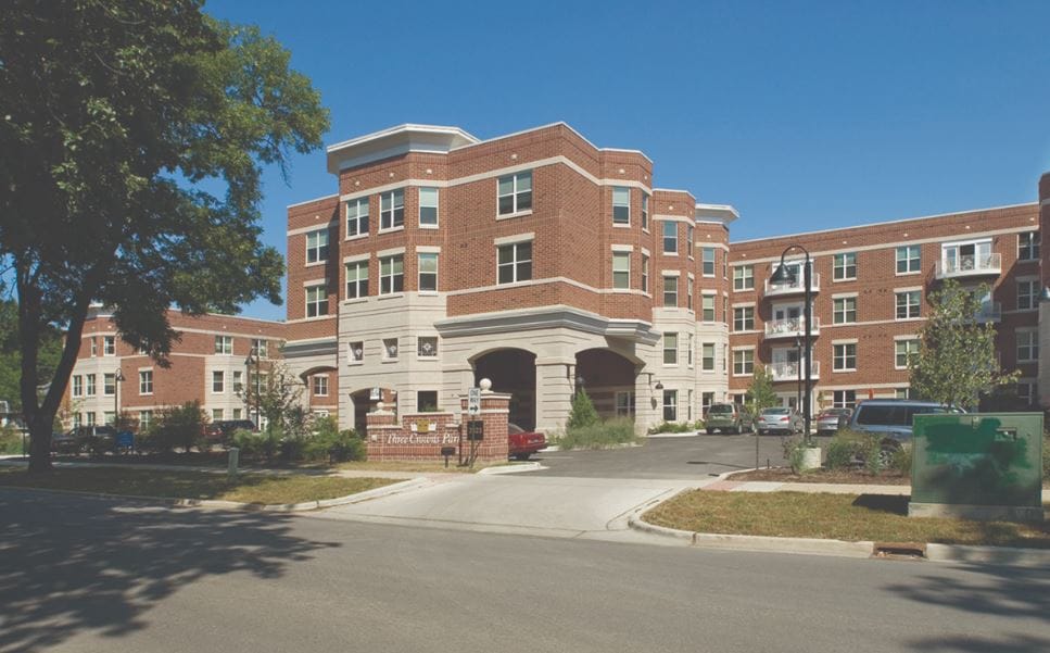 Exterior view of Three Crowns Park senior living facility
