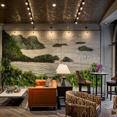 Interior lounge area with decorative wall and seating