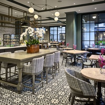 Stylish dining area with modern decor and flowers