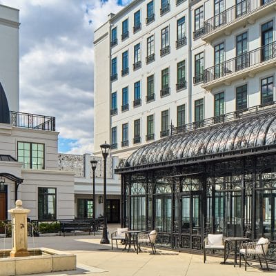 Outdoor courtyard with seating and decorative structure