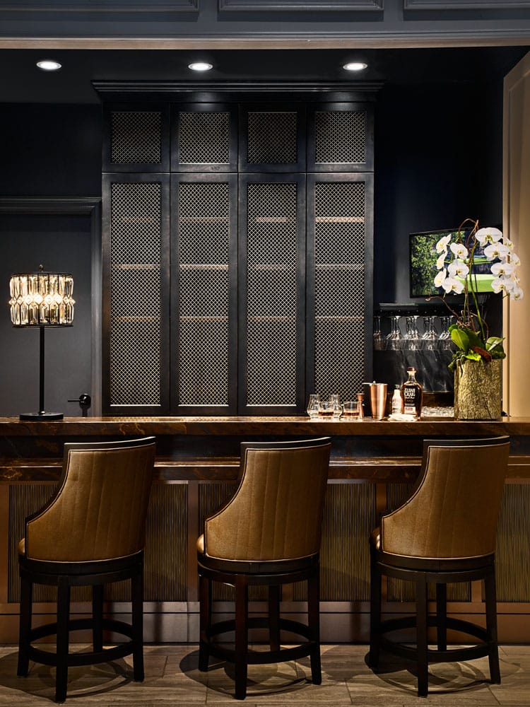 Interior view of a stylish common area with bar seating