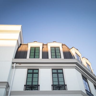 Modern building exterior with blue sky background