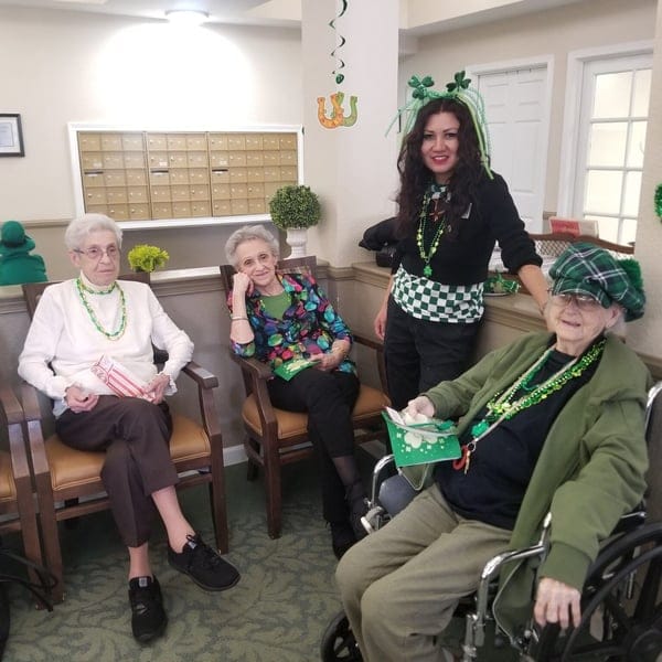 Glassford Place Senior Living, assisted living in Prescott Valley, AZ — Residents celebrating St. Patrick's Day in a common area