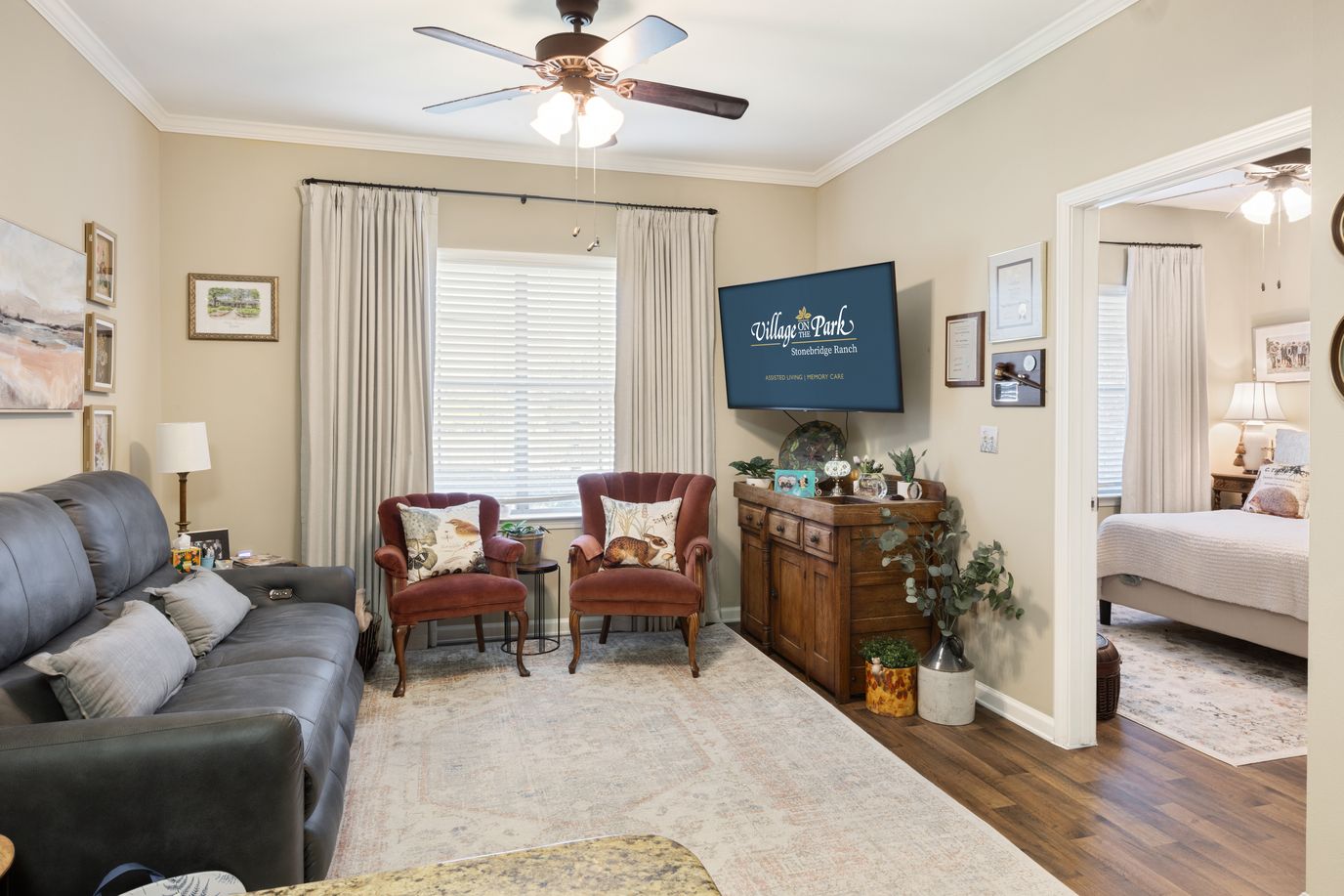 Cozy sitting area in a resident room with a TV