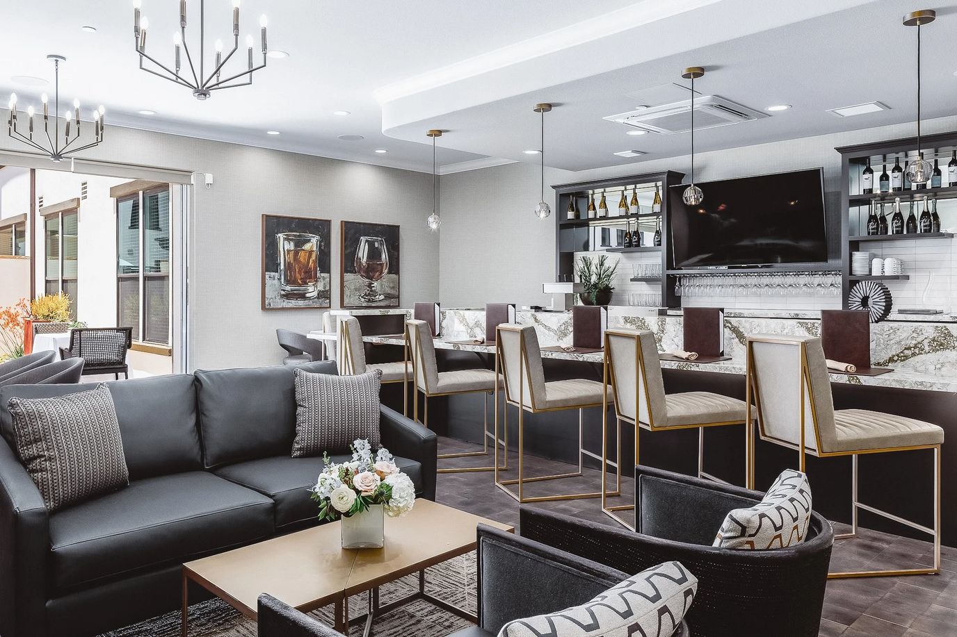 Stylish lounge area with seating and bar
